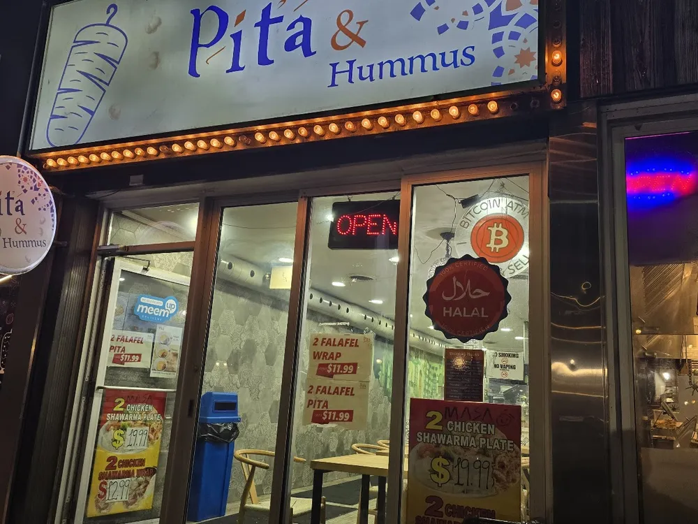 Pita & Hummus on Yonge St at night